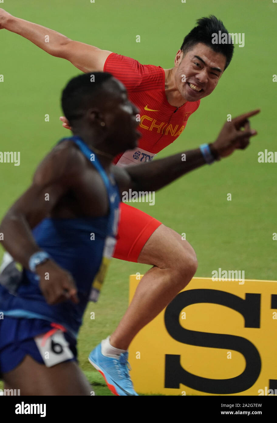 Doha, Qatar. 2nd Oct, 2019. Xie Wenjun (R) of China crosses the finish ...
