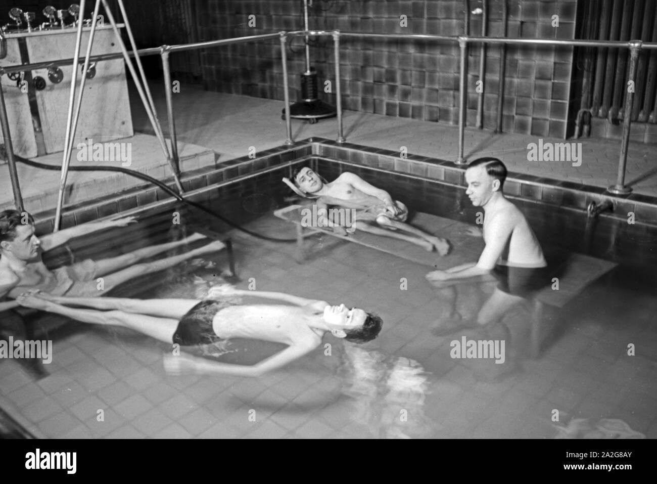 Three men in gym Black and White Stock Photos & Images - Alamy
