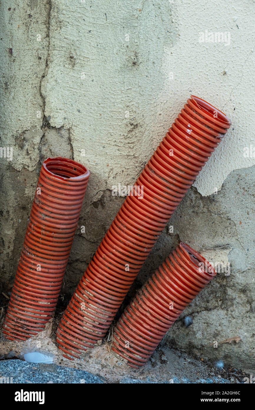 Still life. three plastic tubes for electric cables Stock Photo