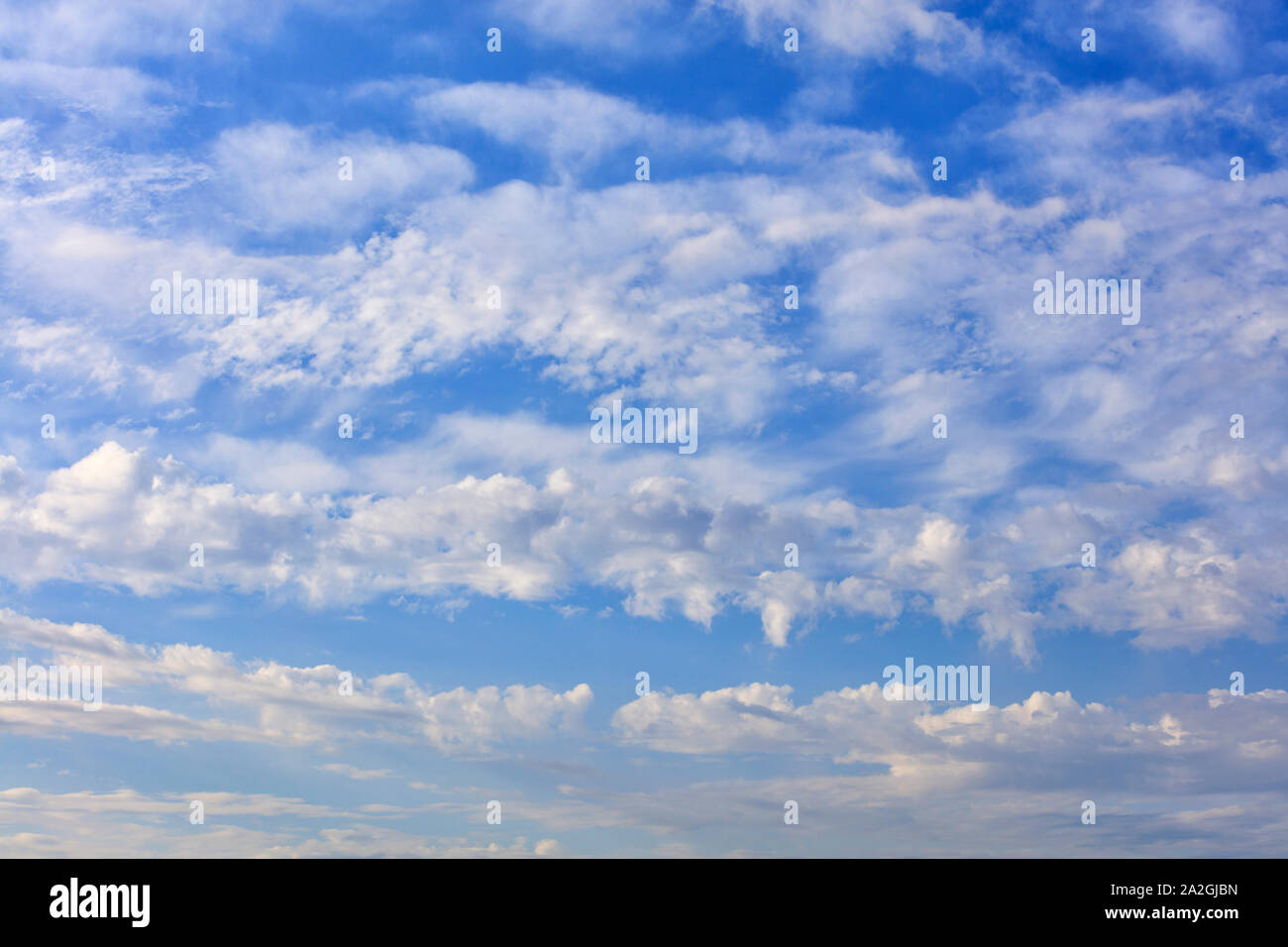 Blue sky background with the texture of white and fluffy clouds Stock ...