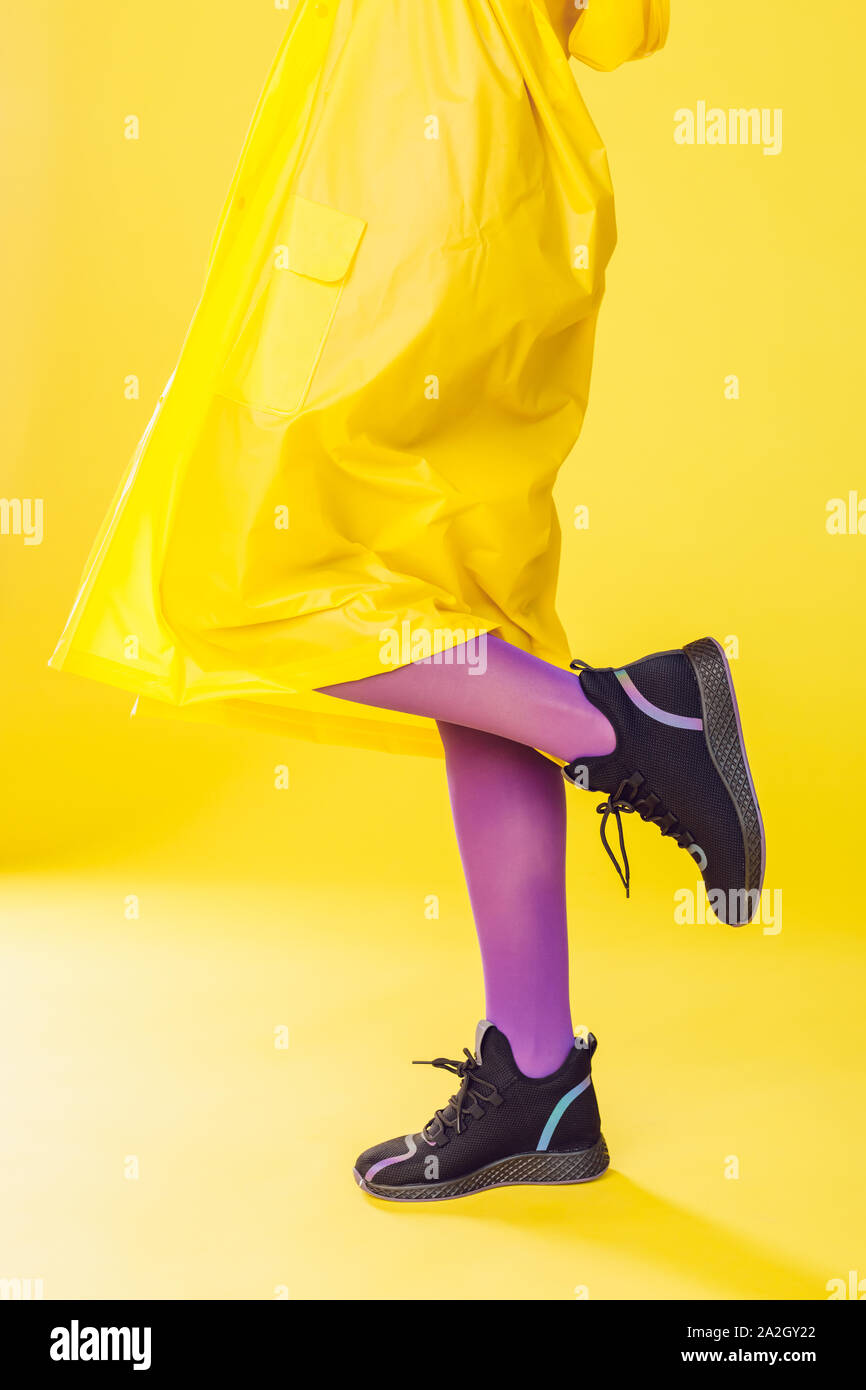 Female legs in purple tights and 