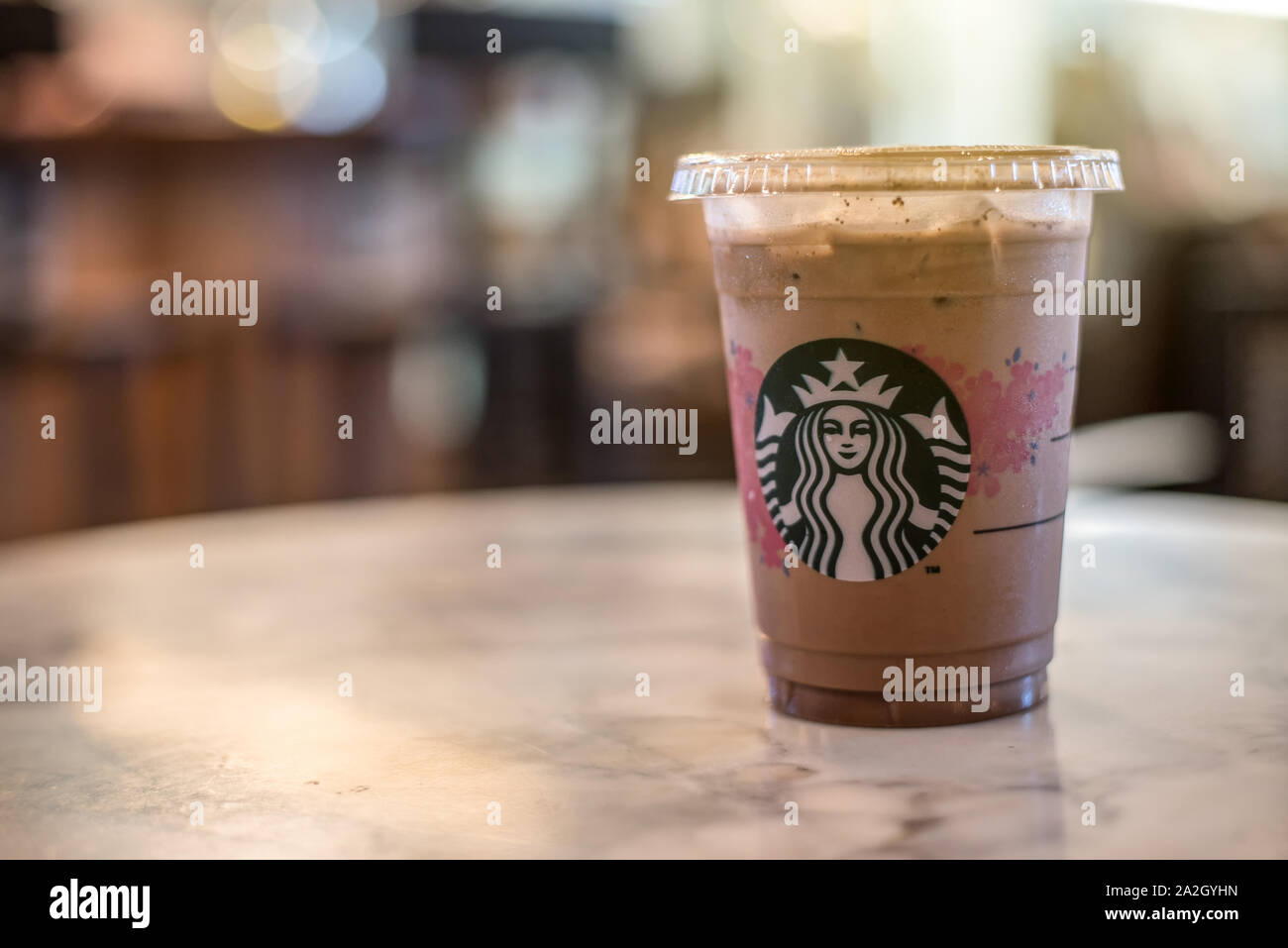 Bangkok Thailand- March ,19, 2018 ; Glass of Starbuck cold chocolate Blended Beverages served at marble table in starbuck shop at Bangkok, Thailand. Stock Photo