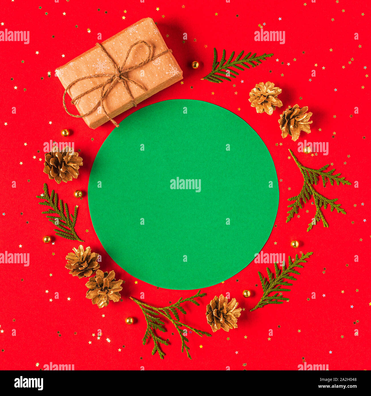 Christmas composition on a red background. Flat lay, top view, mockup. Stock Photo