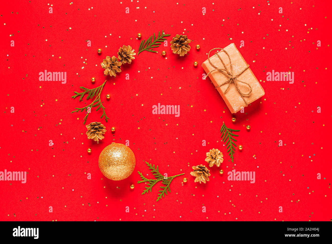 Christmas composition on a red background. Flat lay, top view, mockup. Stock Photo
