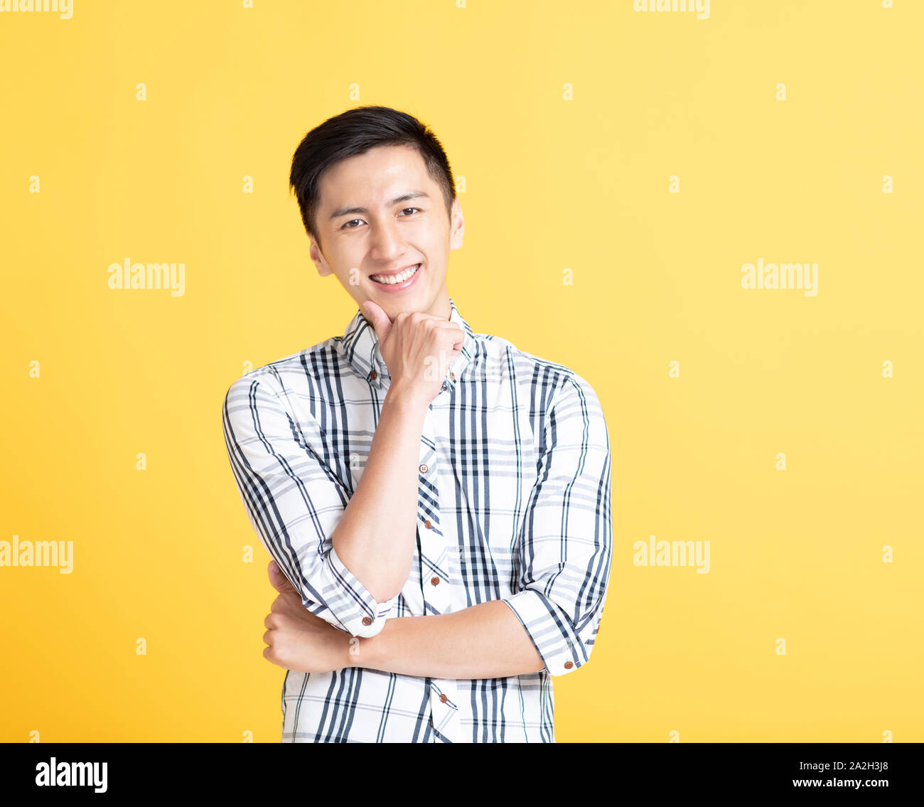 close up handsome young man smiling Stock Photo
