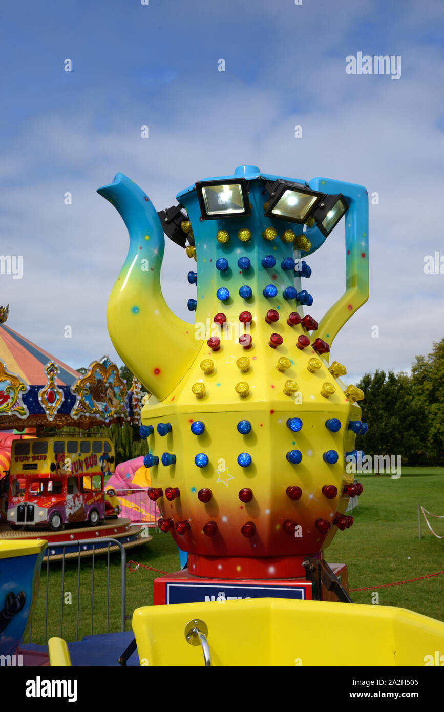 Giant Kitsch Teapot with Flashing Lights on Amusement Ride, Carousel