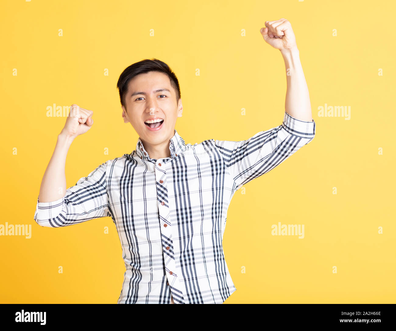 happy young man celebrating victory Stock Photo