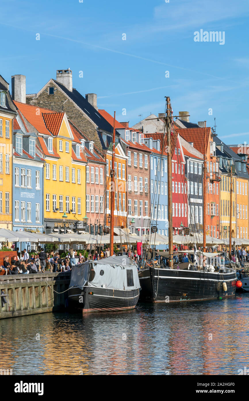 Nyhavn waterfront with colorful houses, canal and entertainment district in Copenhagen, Denmark Stock Photo