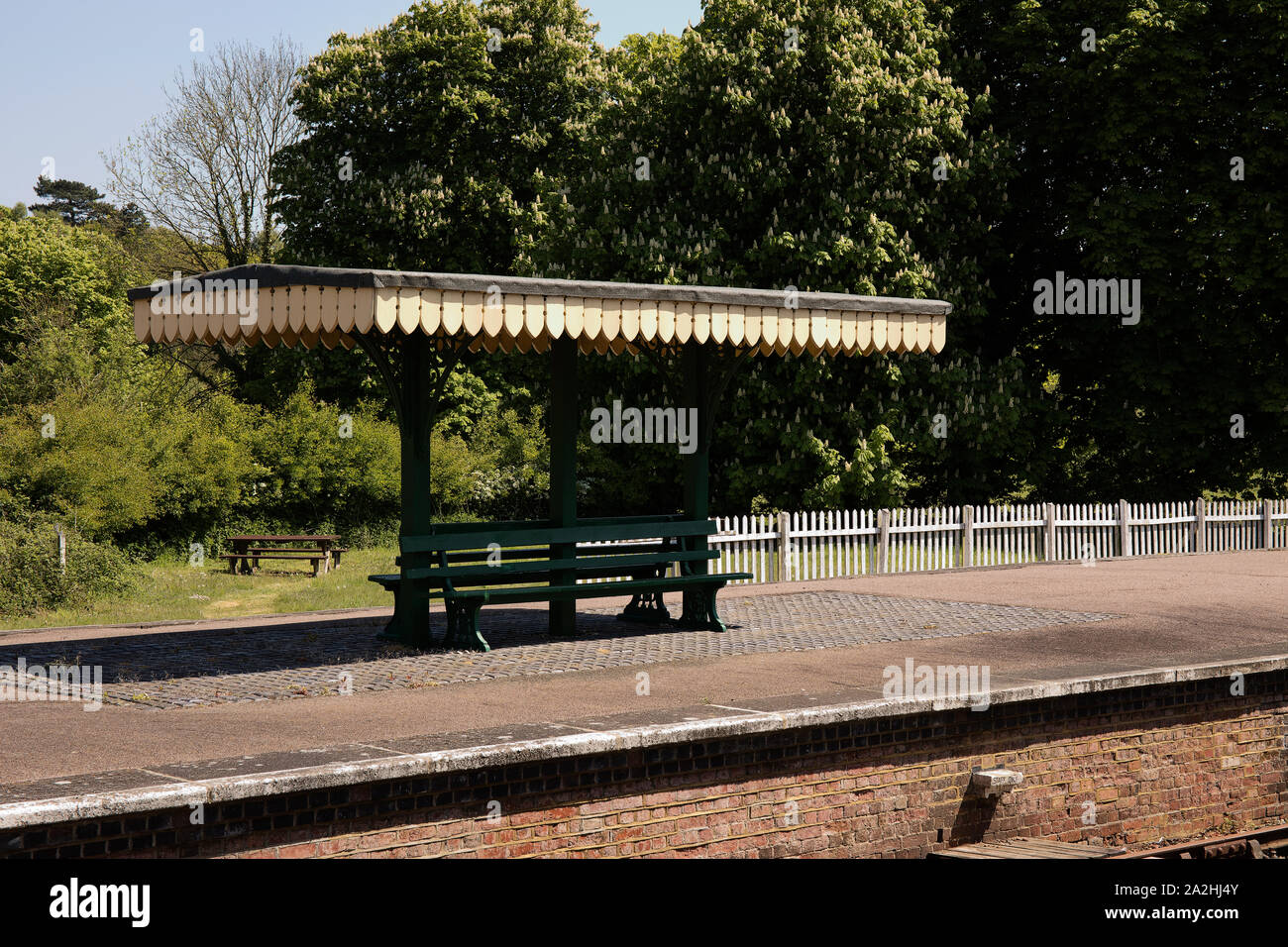 Coverd seating area on ald english railway platform Stock Photo