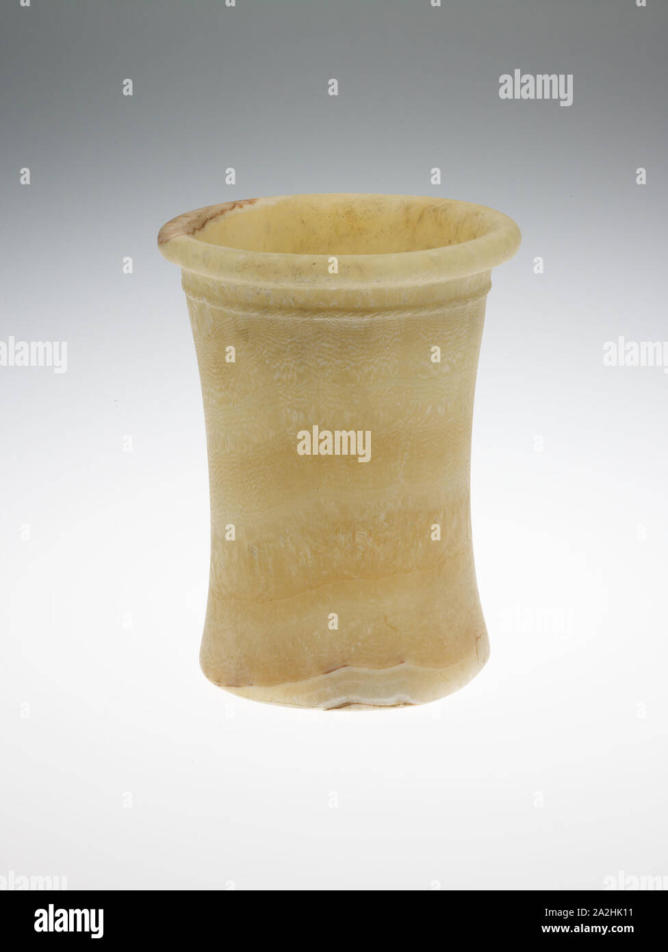 An Egyptian Banded Alabaster Cup, Old Kingdom, probably 1st
