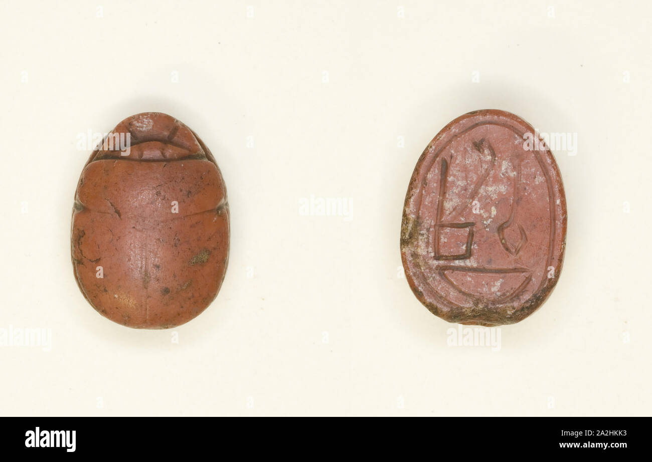 Scarab: Hieroglyphs (Red Crown, nfr- and nb-Signs: Trigramme of Amun), New Kingdom, Dynasties 18–19 (about 1550–1186 BC), Egyptian, Egypt, Stone, 1.6 × 1.3 × 1 cm (5/8 × 1/2 × 3/8 in Stock Photo