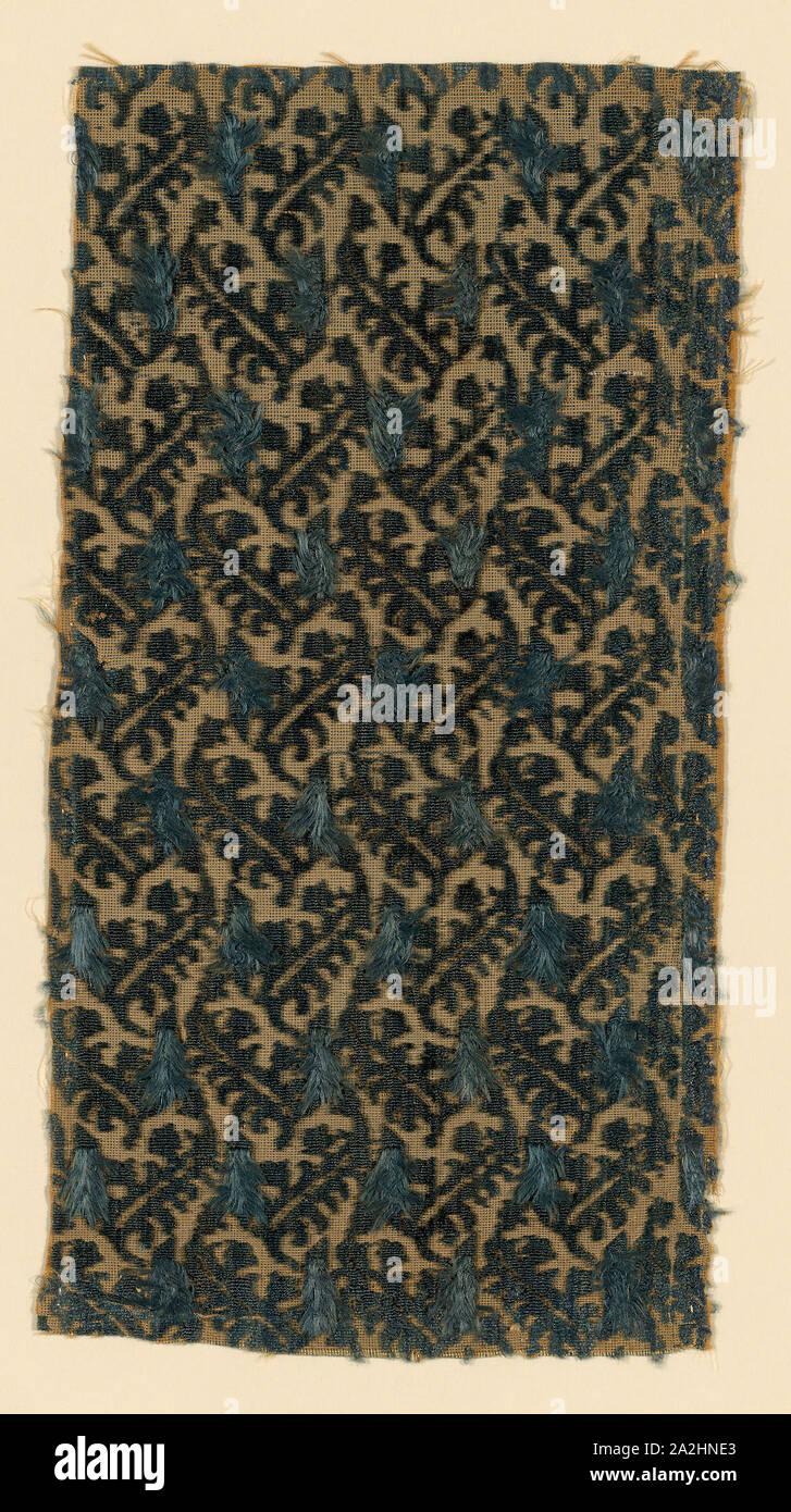 Fragment, 1601/35, Italy, Silk, plain weave with supplementary pile warps forming cut, uncut, and voided velvet, 27.9 x 14.2 cm (11 x 5 5/8 in Stock Photo