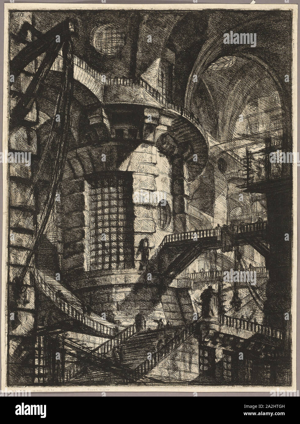 The Round Tower, plate 3 from the second edition of Carceri d’invenzione (Imaginary Prisons), 1750, reworked 1761, Giovanni Battista Piranesi, Italian, 1720-1778, Italy, Etching, engraving, sulphur tint, and burnishing in black on ivory laid paper, 542 x 410 mm (image), 549 x 416 mm (plate), 561 x 425 mm (sheet Stock Photo