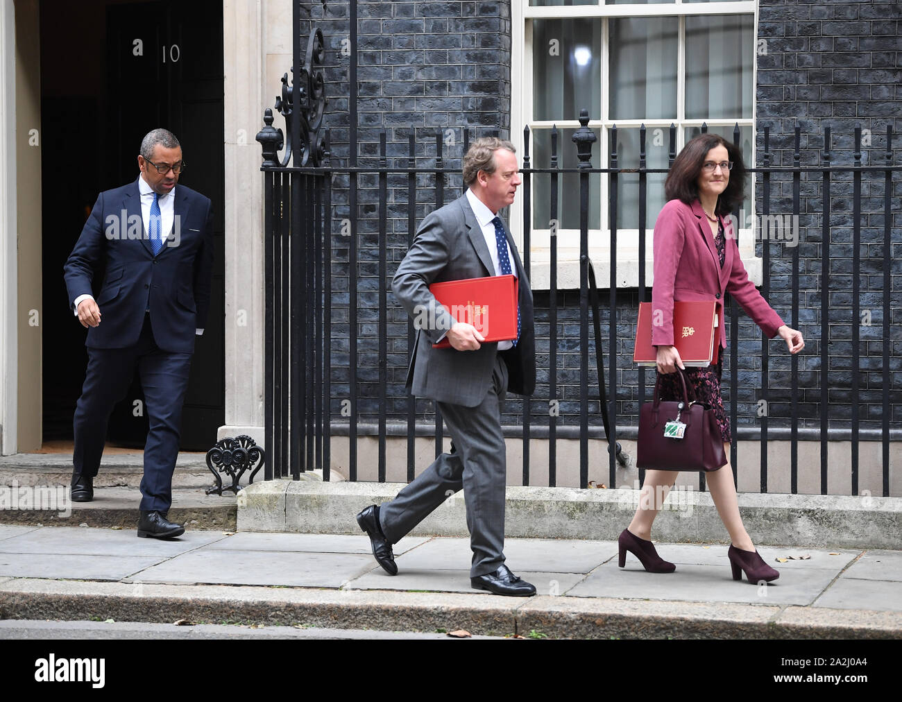 (left to right) Conservative Party Chairman James Cleverly, Secretary of State for Scotland Alister Jack, Environment, Food and Rural Affairs Secretary Secretary Theresa Villiers, leave 10 Downing Street, London, following a Cabinet meeting. Stock Photo
