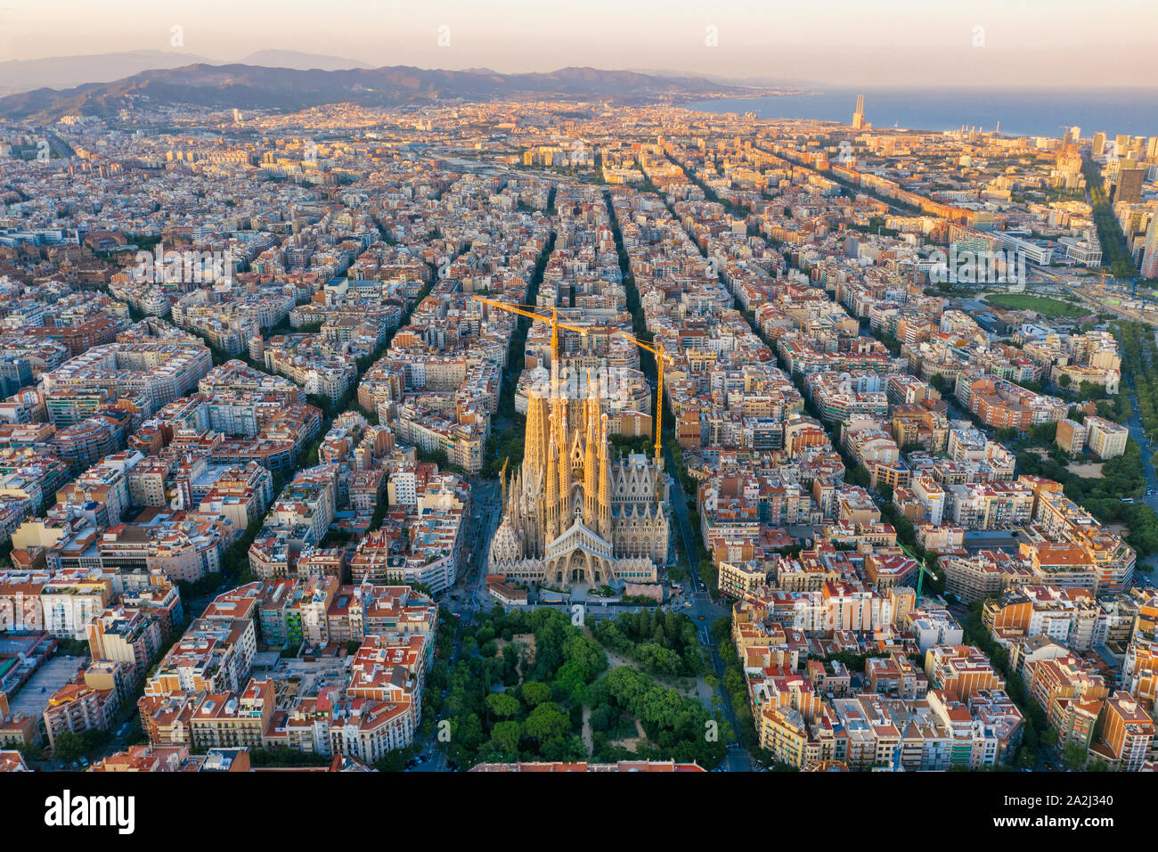Spain, Catalunya, Barcelona, Aerial view of Eixample district and Sagrada Familia Cathedral