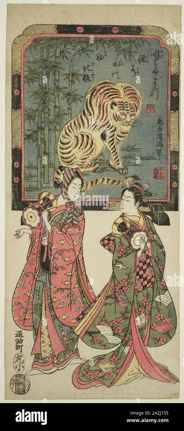 New Year’s entertainers before standing screen of tiger, 18th century, Torii Kiyomitsu I, Japanese, 1735-1785, Japan, Color woodblock print, o-hosoban, benizuri-e, 40.0 x 17.5 cm (15 5/8 x 6 7/8 in Stock Photo