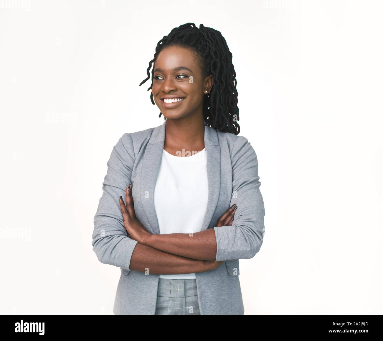Positive Black Business Lady Posing Crossing Hands Over White Background Stock Photo