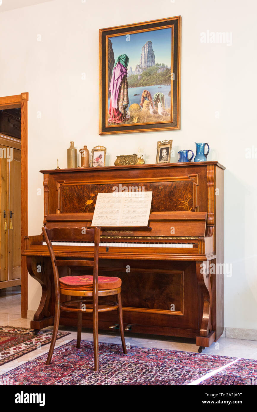 Lauberger & Gloss classic antique upright piano with open sheet music in  bright living room, Lőverek, Sopron, Hungary Stock Photo - Alamy