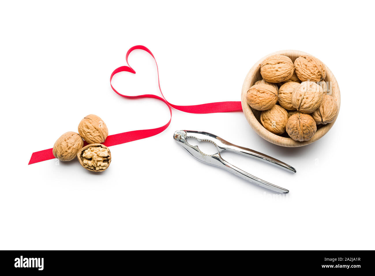 Three nuts a day for heart health, walnuts on bowl on white background Stock Photo Alamy
