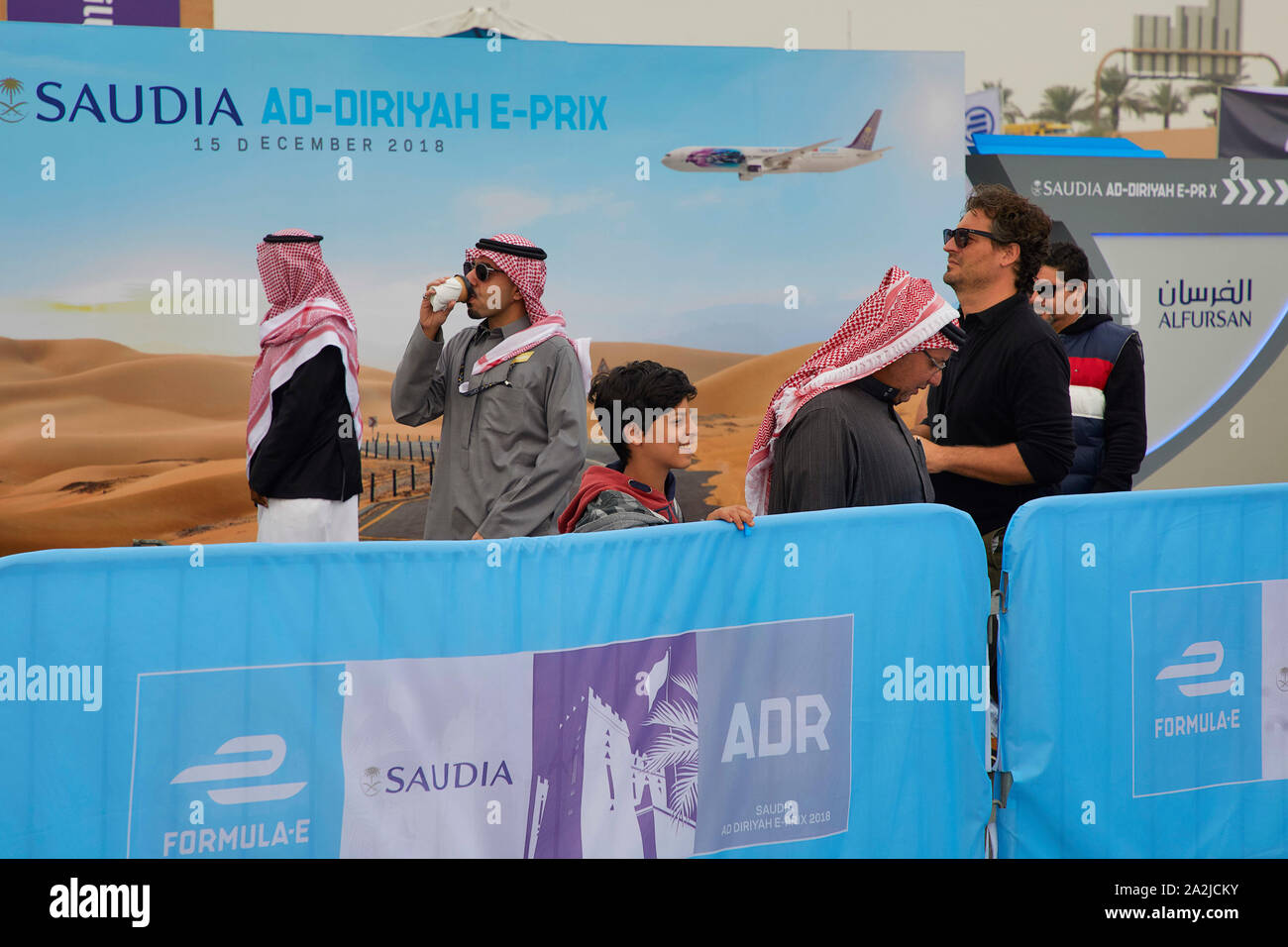 Saudia Arabia Saoedi Arabie Riyad Riaad Formula E touristic bilboards with man in traditional dress. Advertisment for the saudia national airplane  15 Stock Photo