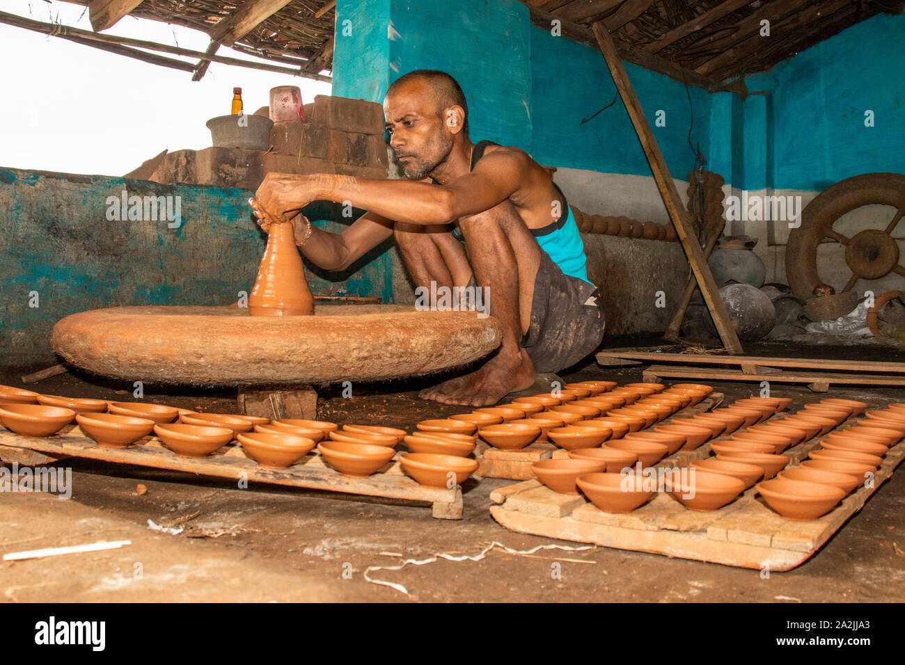 SIJHORA,INDIA,SEPTEMBER - 17, 2019 :Indian potter making oil lamps for Diwali festival. Stock Photo
