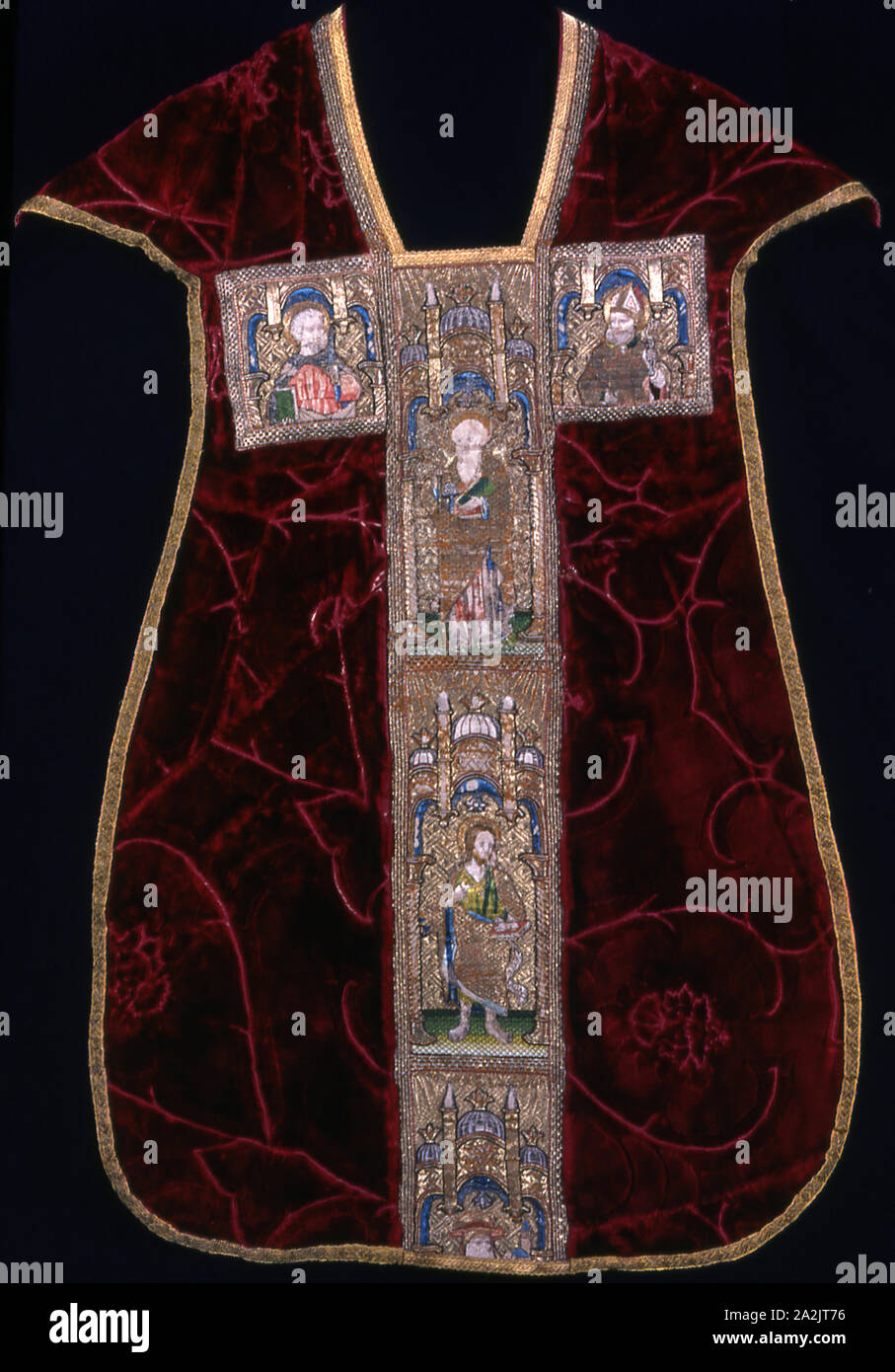 Chasuble, 1425/75, Italy, Silk, warp-float faced satin weave with supplementary pile warps forming cut voided pile-on-pile velvet, orphrey: linen, plain weave, embroidered with silk and gilt-metal-strip-wrapped silk in satin, padded satin, and split stitches, couching, padded couching, and laid work, edged with silk, gilt-metal strip, and gilt-metal-strip-wrapped silk woven tape, 111.2 x 76.8 cm (43 3/4 x 30 1/4 in Stock Photo