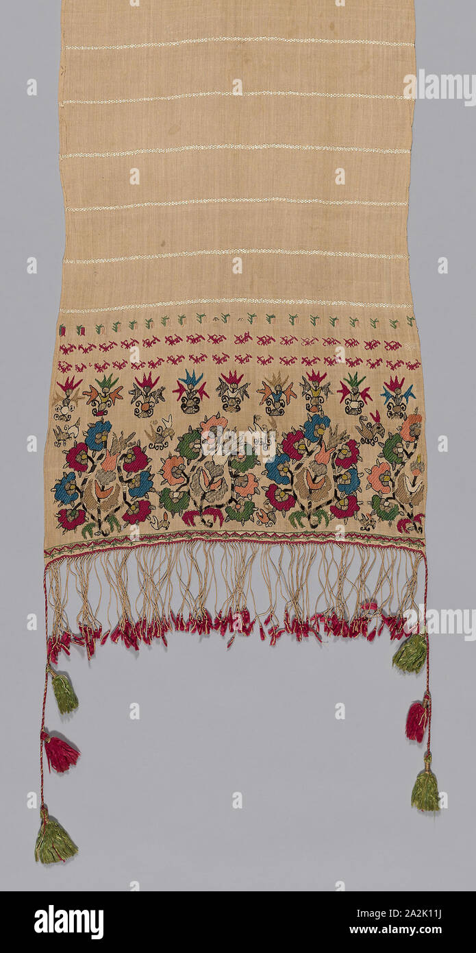 Towel, 18th century, Greece, Northern Sporades Islands, Lesbos, Mytilene, Mytilene, Linen and silk, plain weave self patterned by ground weft floats, embroidered with silk and gilt-metal-strip-wrapped silk in Bosnian, flat, double running, running (pattern darning) twined double running, and satin stitches, edged with plied warp fringe with silk and gilt-metal-strip-wrapped silk tassels, 252.2 x 39.3 cm (99 1/4 x 15 1/2 in Stock Photo