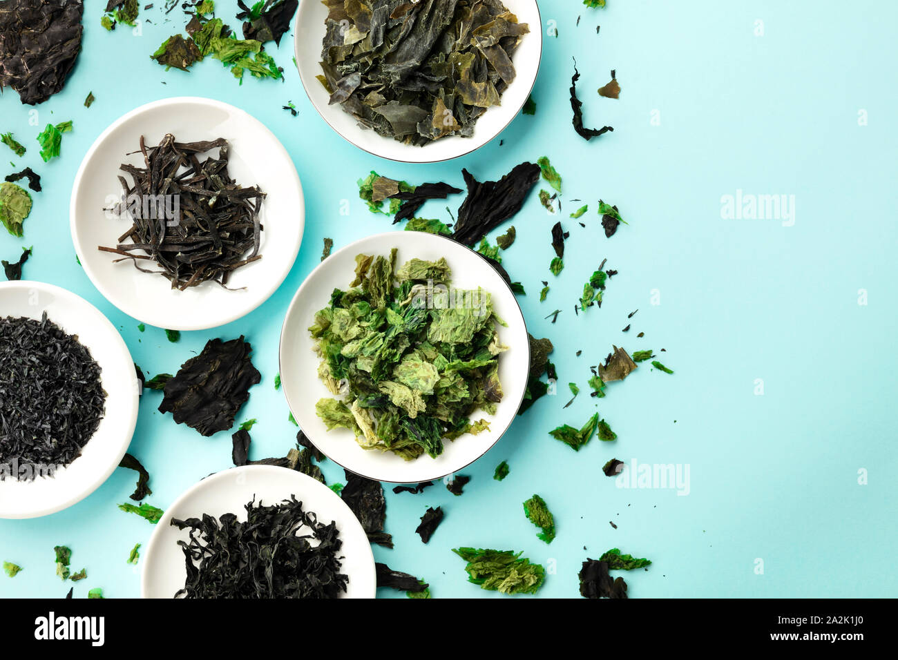 Dry seaweed, sea vegetables, top shot on a light blue background with a place for text Stock Photo