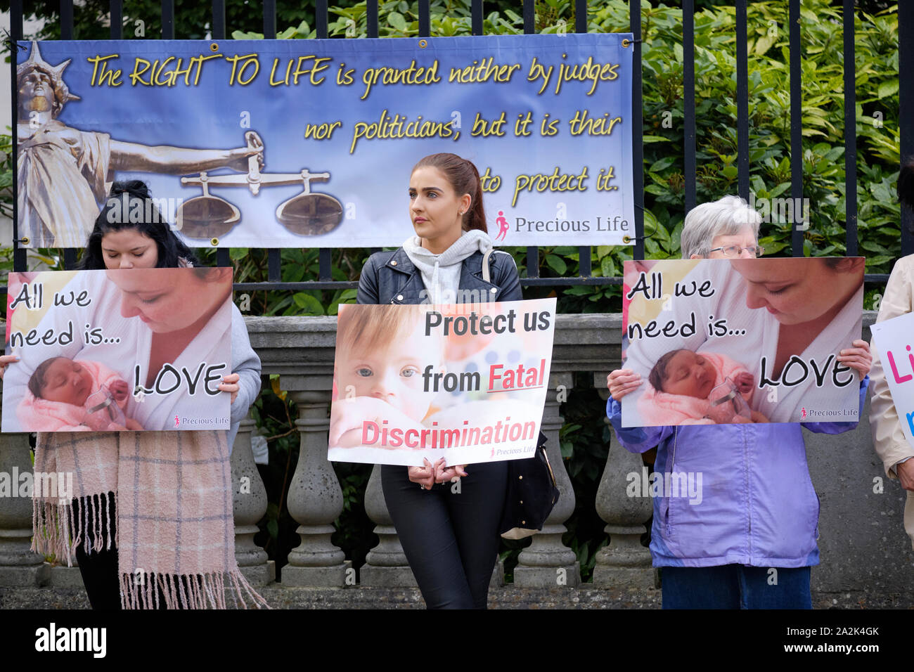 Pro life protesters outsider the Belfast High court with signs, as Northern Ireland abortion laws are being challenged Stock Photo