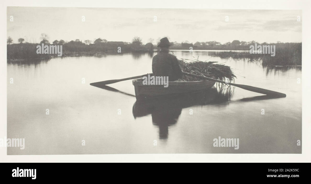 Rowing Home the Schoof-Stuff, 1886, Peter Henry Emerson, English, born Cuba, 1856–1936, England, Platinum print, pl. XXI from the album 'Life and Landscape on the Norfolk Broads' (1886), edition of 200, 13.8 × 27.8 cm (image/paper), 28.6 × 40.8 cm (album page Stock Photo