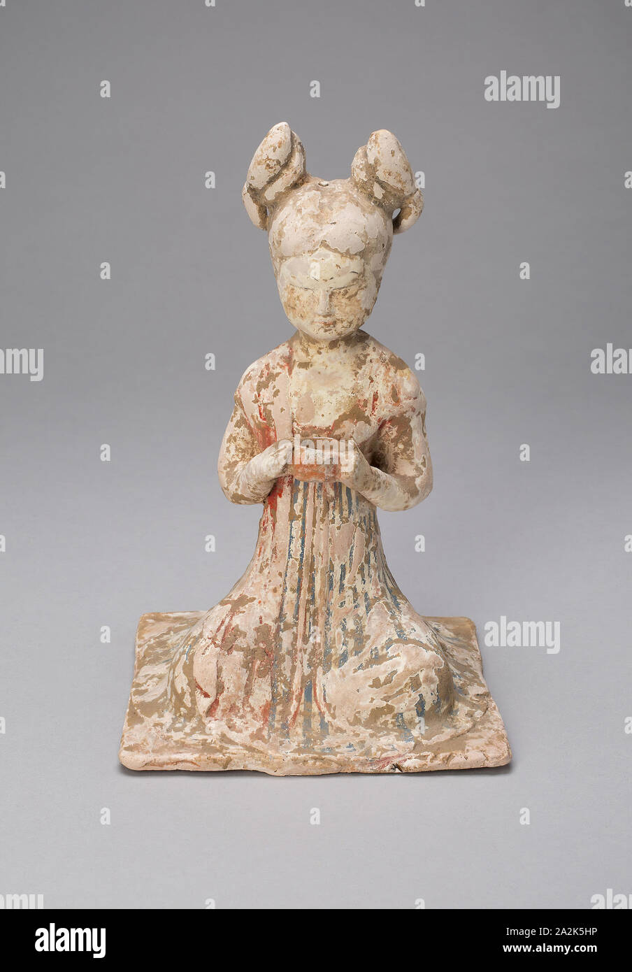 Female Musician, Tang dynasty (A.D. 618–907), late 7th/early 8th century, China, Earthenware with polychrome pigments, 20.6 × 13.3 × 12.8 cm (8 1/8 × 5 1/4 × 5 1/16 in Stock Photo