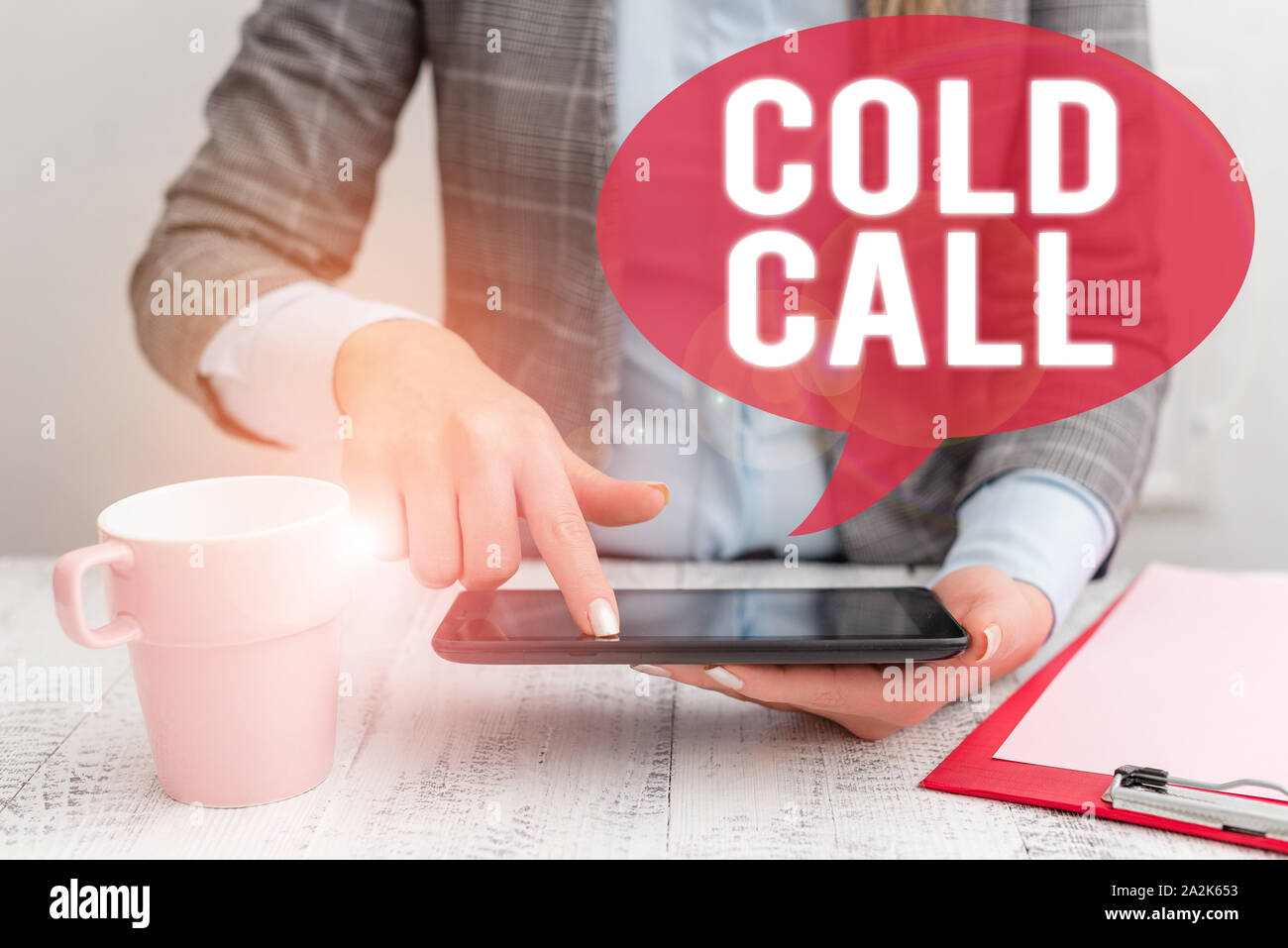 Text sign showing Cold Call. Business photo showcasing Unsolicited call made by someone trying to sell goods or services Business woman sitting with m Stock Photo