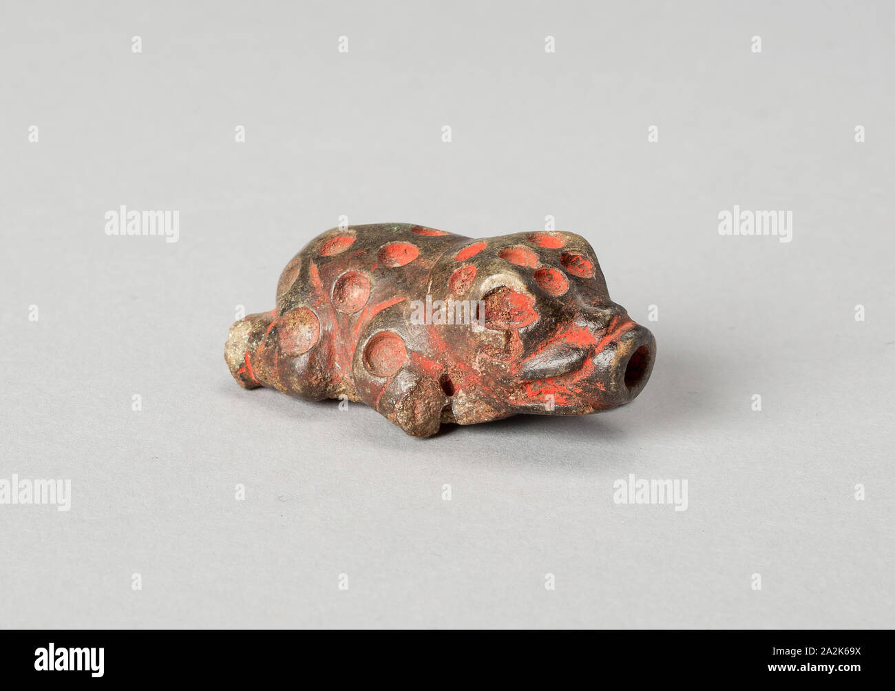 Container for Lime in the Shape of a Frog, c. A.D. 600/1000, Tiwanaku-Wari, South coast peru or northern Bolivia, Bolivia, Stone with pigment (inlay missing), 3.9 × 2.2 cm (1 1/2 × 3/4 in Stock Photo