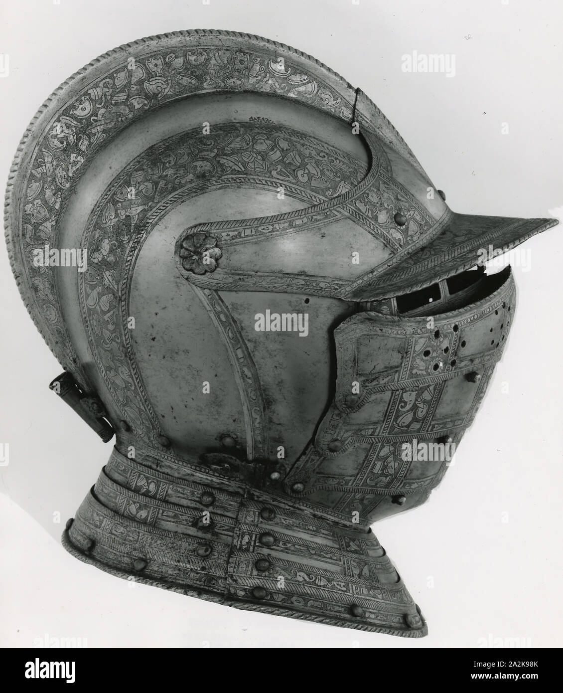 Close Helmet of Three-Quarter Armor, c. 1575, Italian, Milan, Steel with gilding Stock Photo