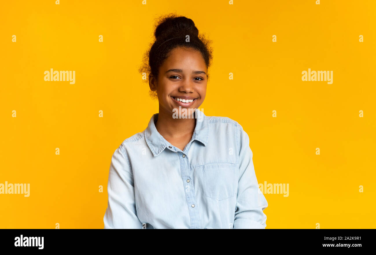Portrait of cute african american girl smiling to camera Stock Photo ...