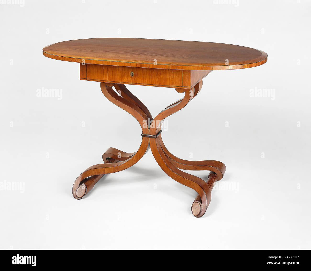 Center Table, c. 1820, Made by the Firm of Josef Danhauser (father and son, 1804-1838), Josef Danhauser, Sr. (Austrian, 1780-1829) and Josef Danhauser, Jr. (Austrian, 1805-1845), Vienna, Austria, Vienna, Cherrywood and metal, 75 × 126 cm (29 1/2 × 49 1/2 in Stock Photo