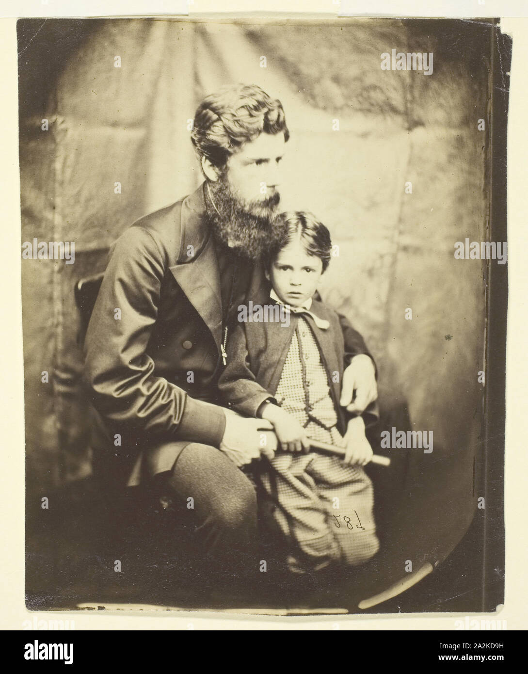 Rev. James Langton Clark and son Charles (Robin), 1864, Lewis Carroll (Charles Lutwidge Dodgson), English, 1832–1898, England, Albumen silver print, 14.2 × 11.8 cm (image), 14.8 × 12 cm (paper Stock Photo