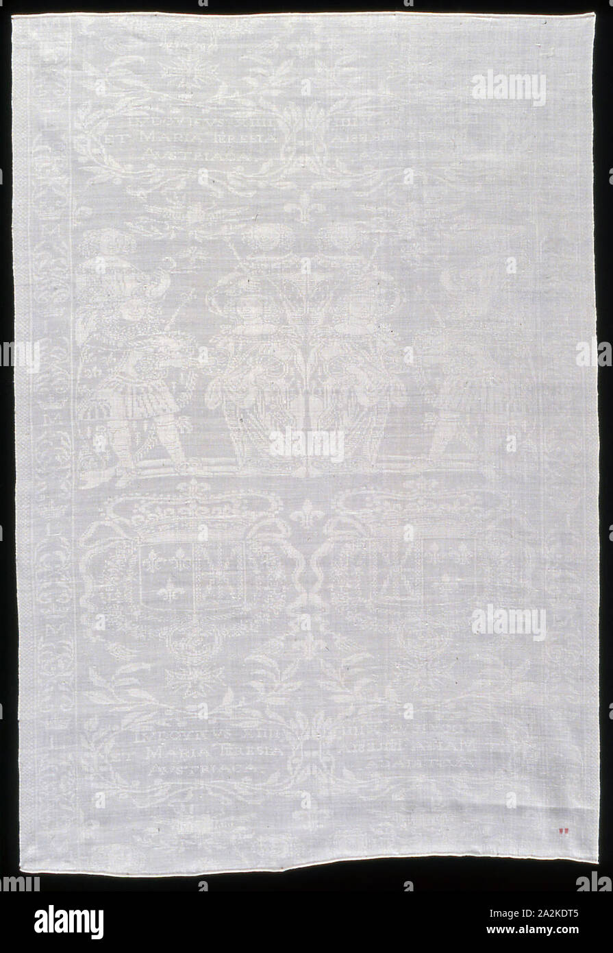 Table Napkin Commemorating the Marriage of Louis XIV (1638–1715) and Marie-Therese (1638–1683) in 1660, c. 1660, France, Linen, satin weave self-patterned by reversing of faces: initials embroidered in cotton floss, 103.9 × 71.1 cm (40 7/8 × 28 in Stock Photo