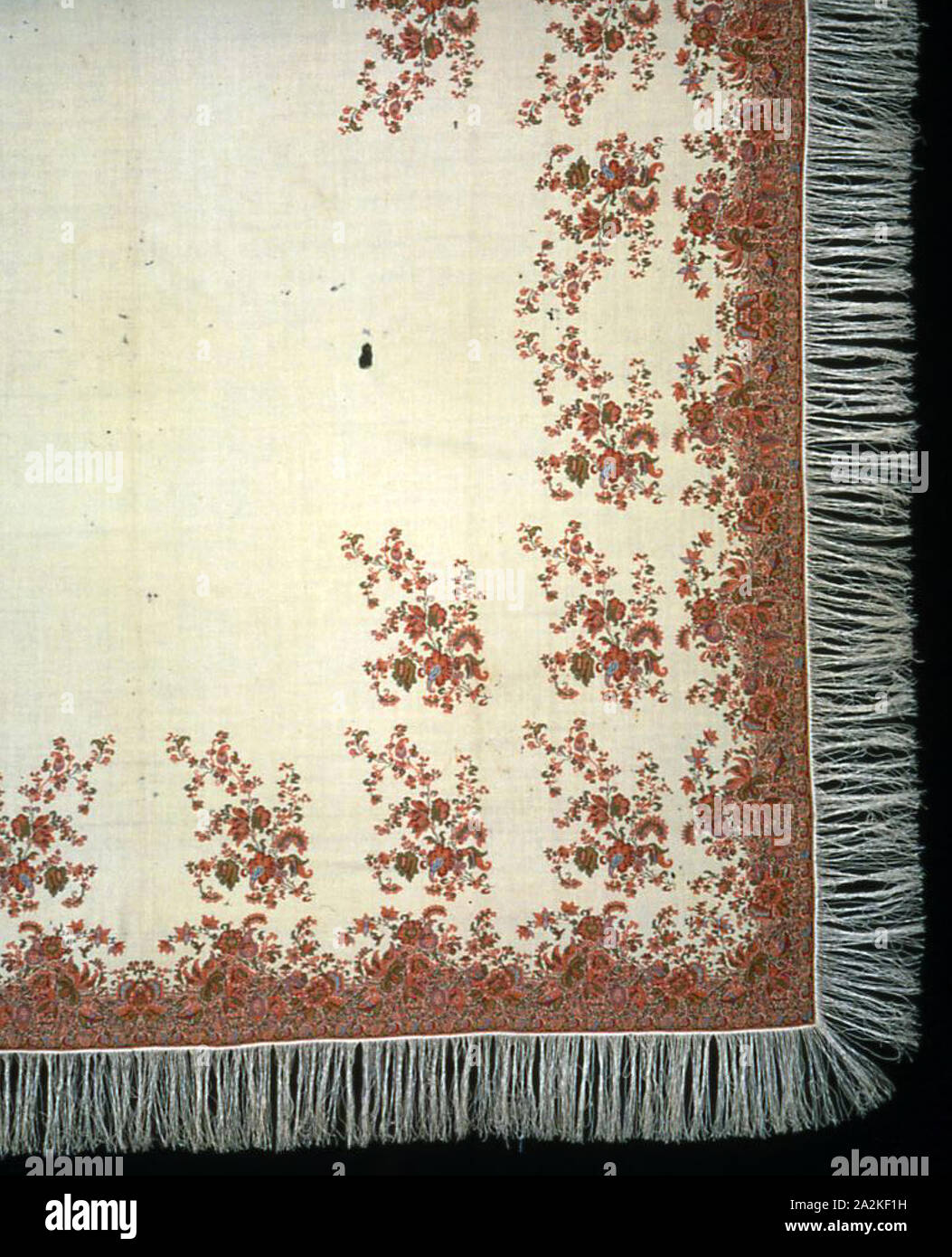 Square Shawl, 1840, England, Norwich, or Scotland, Edinburgh, England, Wool, silk, and cotton, center of weft-float faced 1:3 'Z' twill weave, patterned areas of warp-float faced 3:1 'Z' twill weave with supplementary patterning wefts bound in weft-float faced 1:3 'Z' twill interlacings, attached silk, warp-faced weft ribbed plain weave extended ground weft fringe, two selvages present, woven on loom with Jacquard attachment, 195.9 × 191.6 cm (77 1/8 × 75 3/8 in Stock Photo
