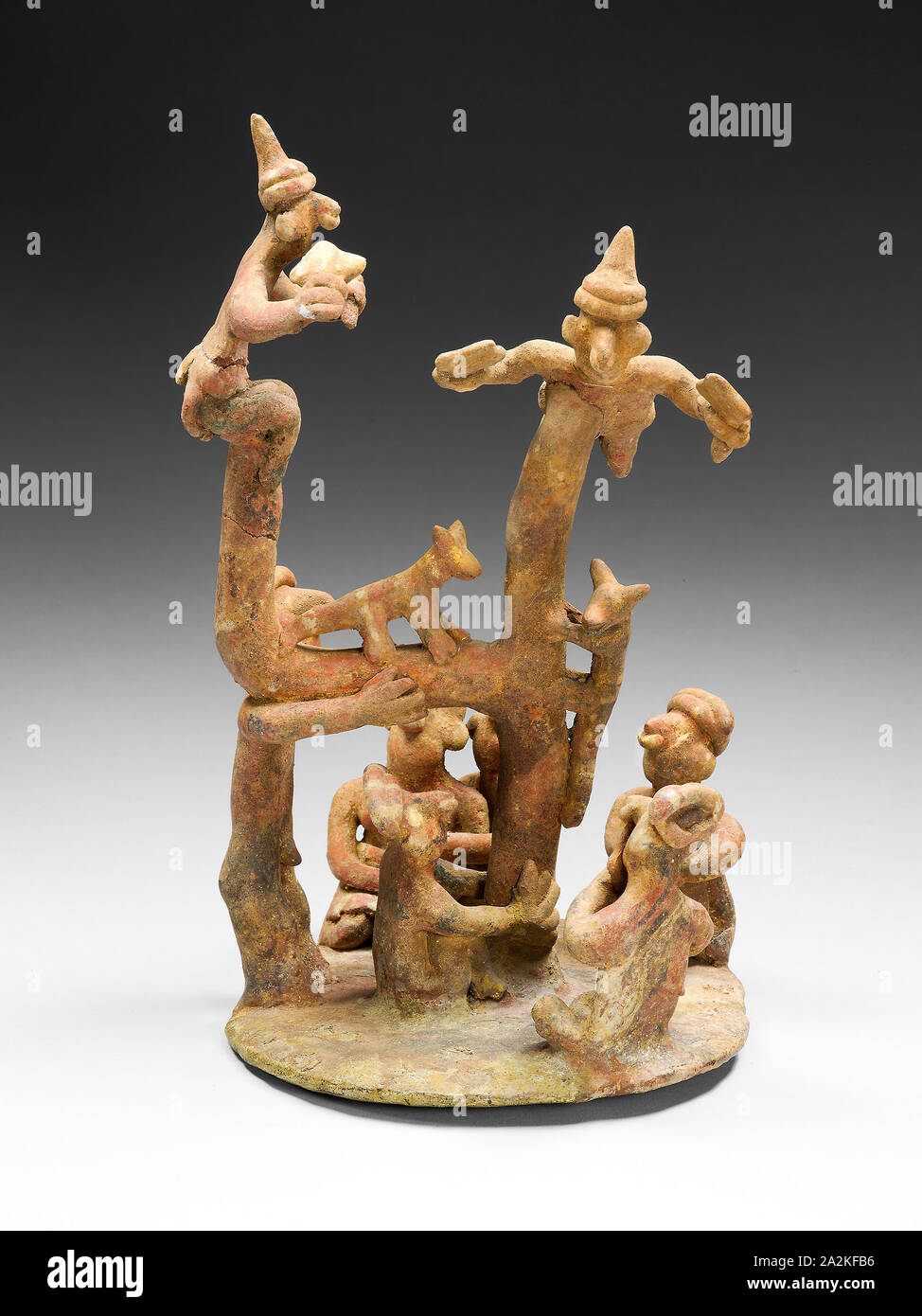 Model of a Tree-Climbing Ritual, A.D. 100/800, Nayarit, Ixtlán del Río, Nayarit, Mexico, Nayarit state, Ceramic and pigment, H. 22.8 cm (9 in Stock Photo