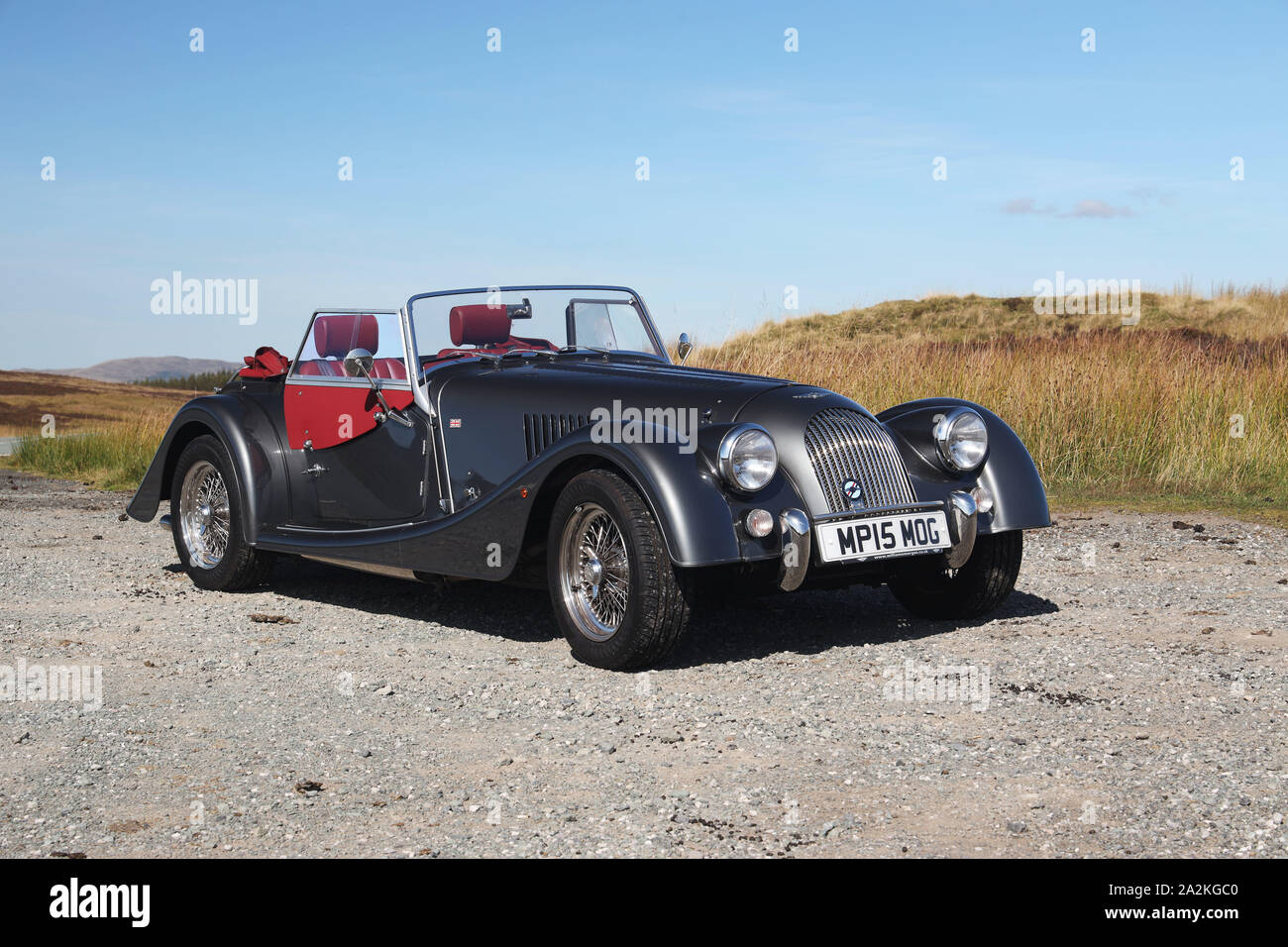 Morgan hand made sports car parked on the mountain road between Bala and Llangynog. September 2019 Stock Photo