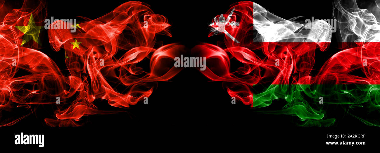 China vs Oman, Omani smoke flags placed side by side. Thick colored