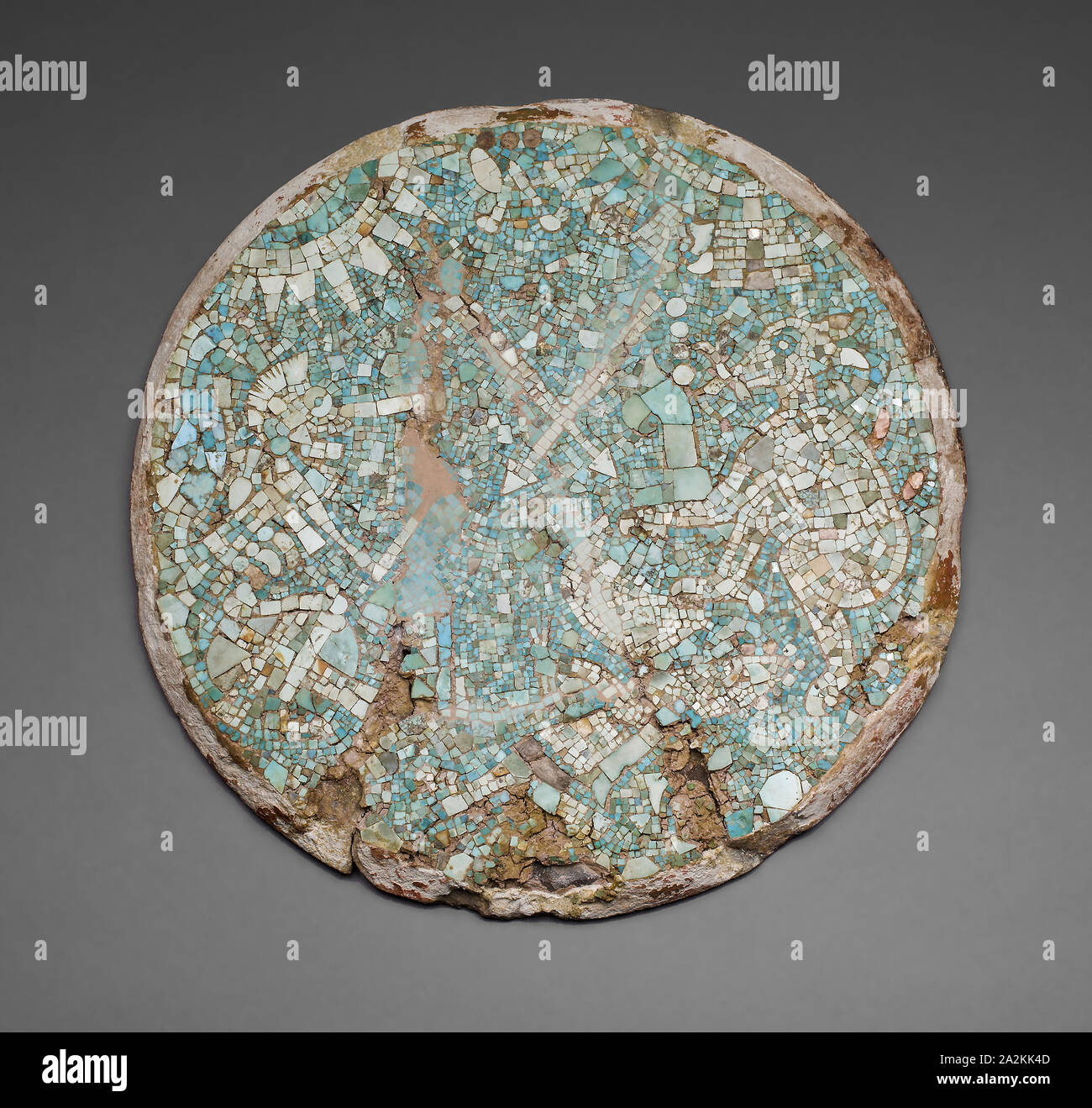 Mosaic Disk with a Mythological and Historical Scene, 1400/1500, Mixtec, Northern Oaxaca, Mexico, Oaxaca state, Turquoise, earthenware, stucco, spondylus shell, mother of pearl, and iron pyrite, with pigment, Diam. 30.5 cm (12 in Stock Photo