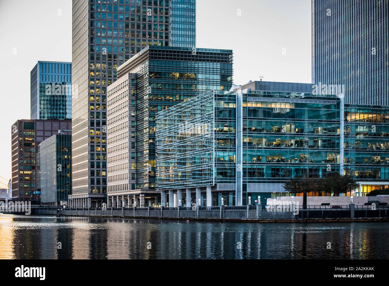 Clifford Chance London Canary Wharf London - South Dock - waterside buildings Canary Wharf South Dock quayside. Clifford Chance law firm in foreground Stock Photo