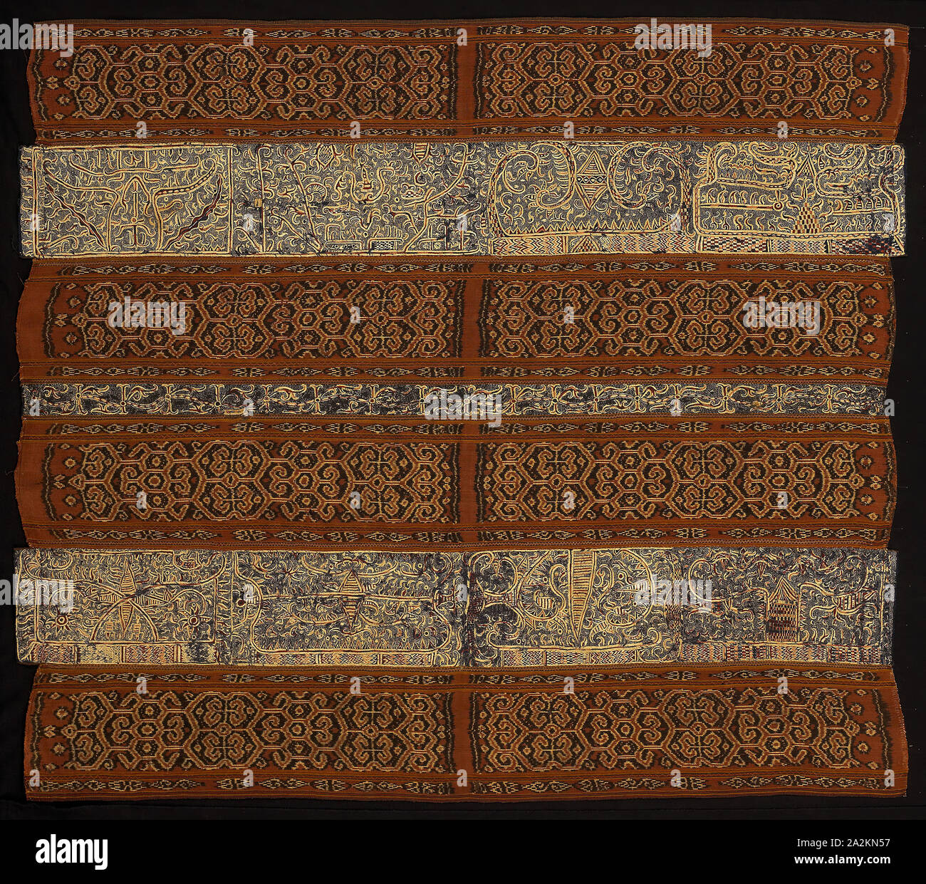 Woman’s Ceremonial Skirt (tapis), 18th century (?), Paminggir people, Indonesia, South Sumatra, Lampung area, Indonesia, Five panels joined: three panels of stripes of silk and cotton, warp resist dyed (warp ikat) plain weave (paired warps), stripes of warp-faced, weft ribbed plain weave with supplementary brocading wefts and one stripe of cotton, plain weave, embroidered with silk in back, double running, stem and surface satin stitches and two panels of cotton, plain weave, embroidered with silk in back, stem and surface satin stitches, 138.6 x 121.8 cm (54 1/2 x 47 7/8 in Stock Photo