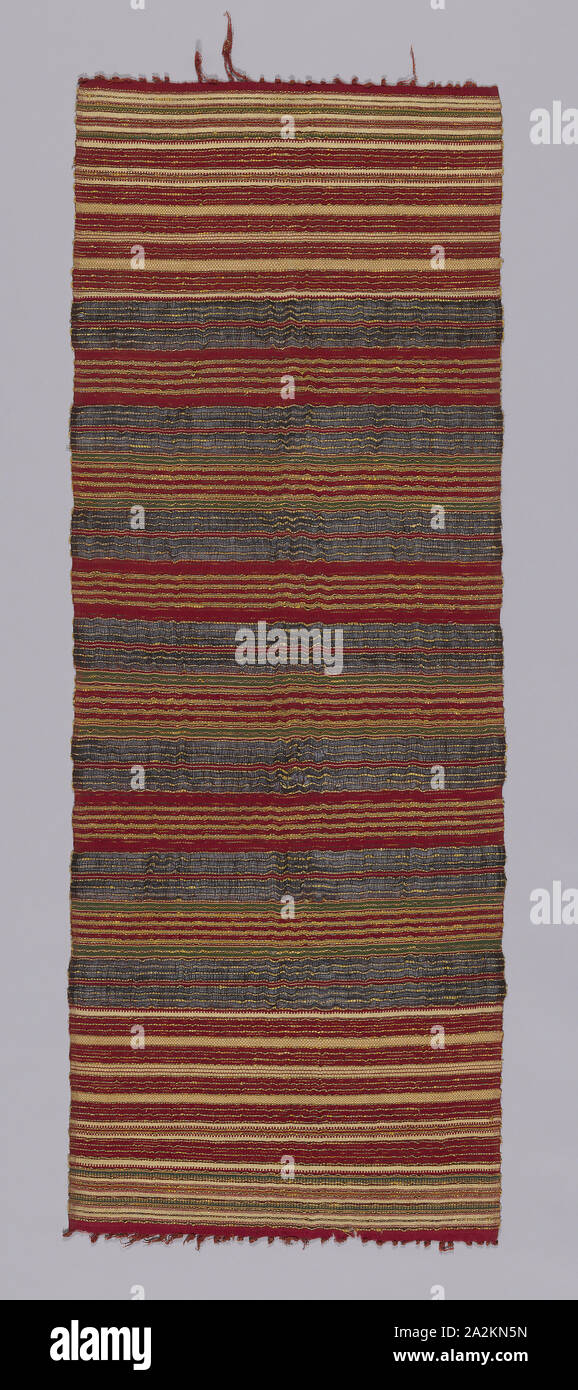 Cermonial Textile, 19th century, Indonesia, Bali, Buleleng, Bali, Cotton, bast fiber (probably ramie), and gold-leaf-on-paper-strip-wrapped bast fiber (probably ramie) bands of plain weave, weft resist dyed (weft ikat) plain weave and weft-faced plain weave, knotted main warp fringe, 124.5 × 43.4 cm (49 × 17 1/8 in Stock Photo
