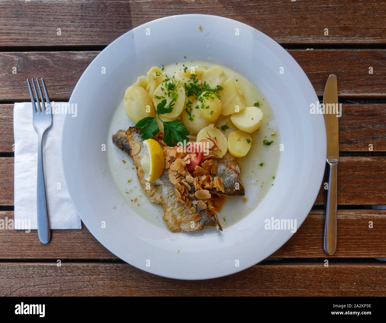 Restaurant 'Gutsschänke' in Meersburg:  common whitefish of Lake Constance with almond butter and boiled potatoes, Baden-Württemberg, Germany Stock Photo