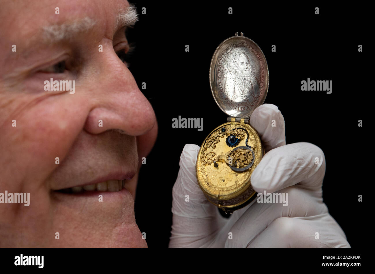 Dr John C Taylor with his 17th Century astronomical silver and gilt oval watch with a portrait of King James VI by Scottish clockmaker David Ramsay which will be on display as part of 'The Luxury of Time: Clocks from 1550-1750' exhibition at the National Museum of Scotland, Edinburgh, from 4 October 2019. Stock Photo