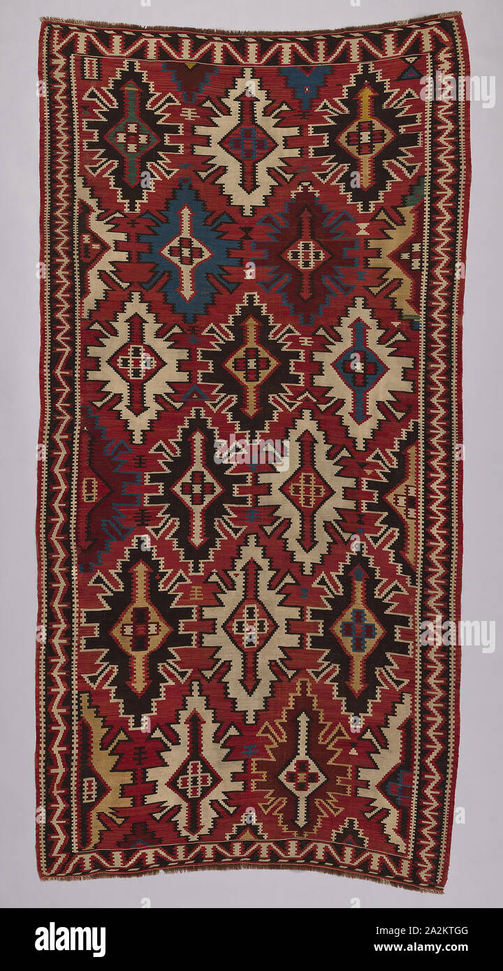 Shirvan Kilim, Last quarter 19th century, Azerbaijan, Shirvan area, Caucasus, wool, plain and slit tapestry weaves, weft wrapping, cut warp fringe, 374.7 × 183.5 cm (147 1/2 × 72 1/4 in Stock Photo