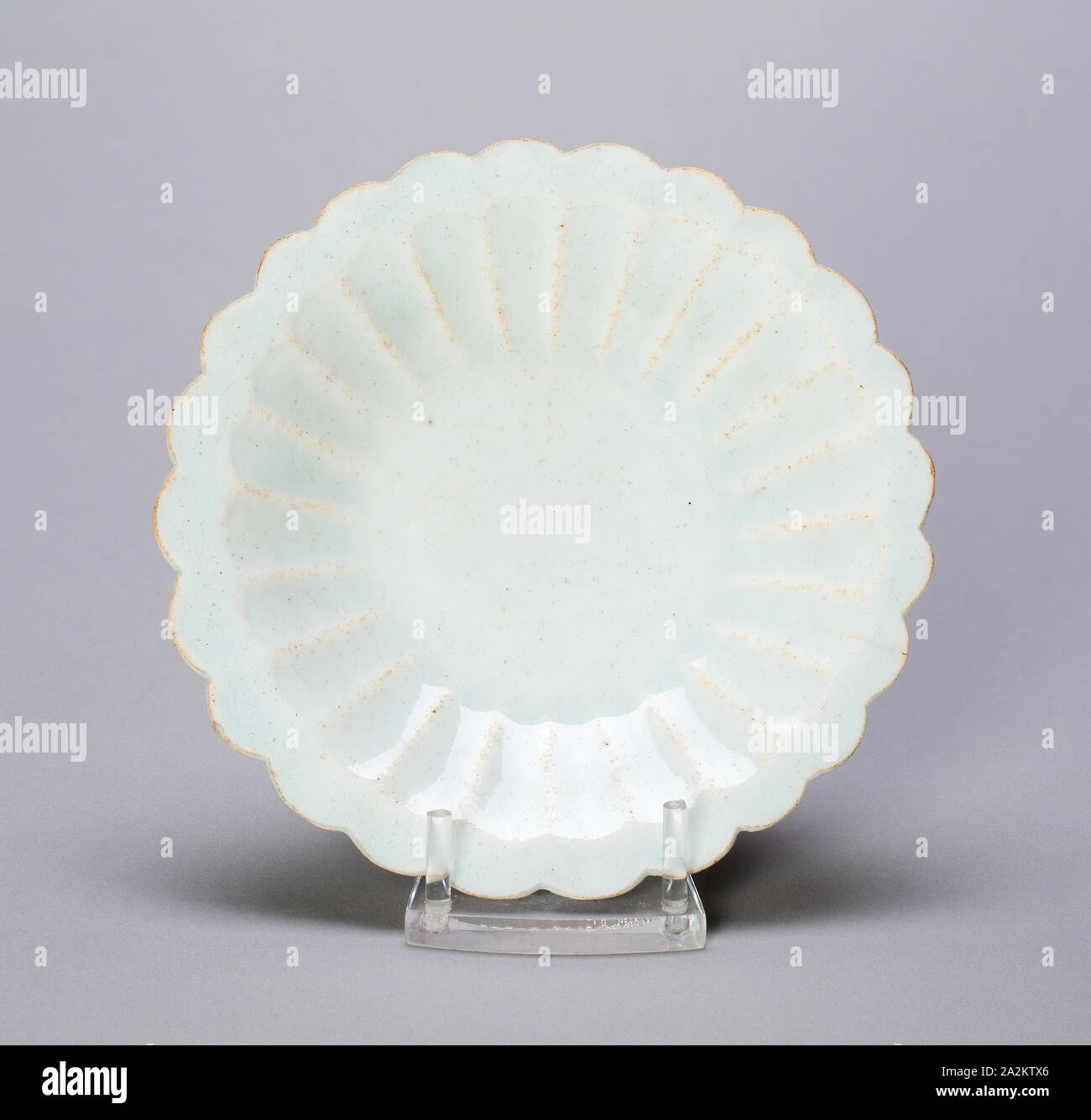 Dish with Lobed Cavetto and Foliate Rim, Song dynasty (960–1279), 11th/12th century, China, Qingbai ware, glazed porcelain, H. 2.0 cm (13/16 in.), diam. 10.7 cm (4 3/16 in Stock Photo